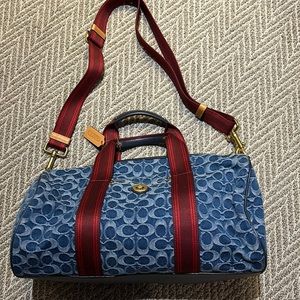 Coach duffel bag. Medium size, denim & red